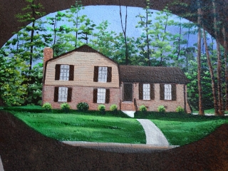 HOMES THEY OWNED OVER THE YEARS PAINTED ON THE SAW BLADE