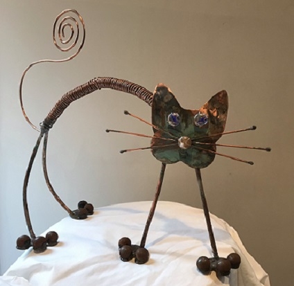 "SLINKY CAT" COPPER, BRASS AND GLASS SOLD